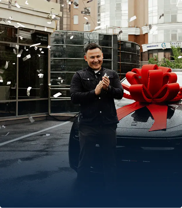 Победитель акции Абай из Шымкента с автомобилем Zeekr 001